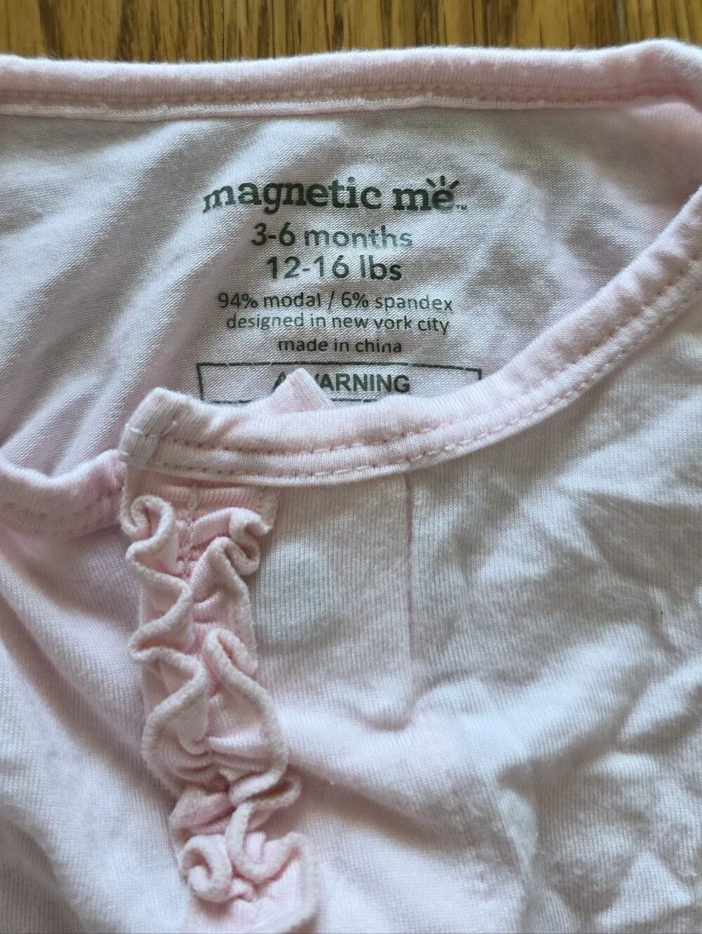 Magnetic Me Baby Pale Pink Ruffle-Front Footed One-Piece